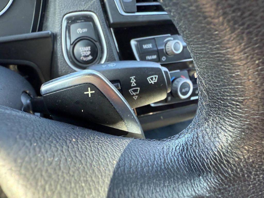 used 2015 BMW 228 car, priced at $8,999