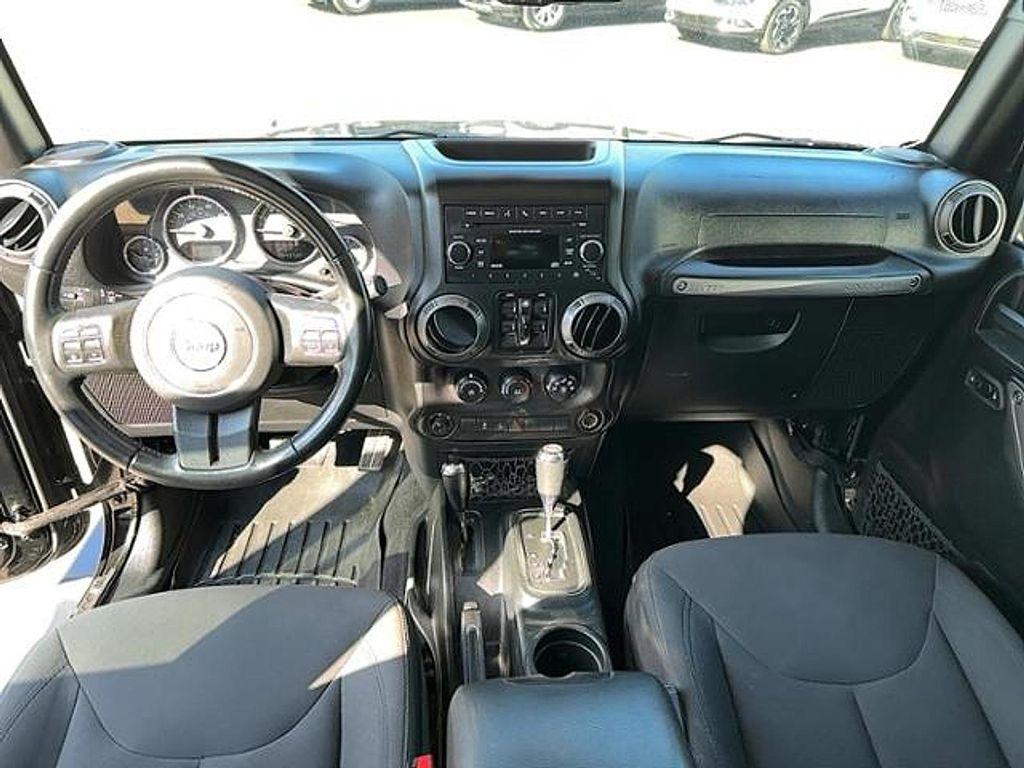 used 2018 Jeep Wrangler JK Unlimited car, priced at $23,995