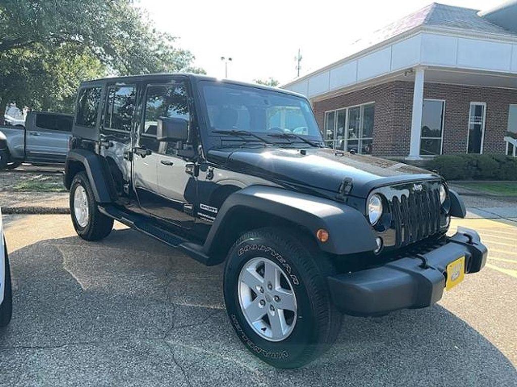 used 2018 Jeep Wrangler JK Unlimited car, priced at $23,995