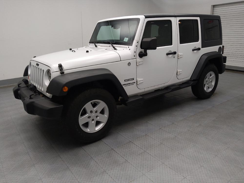 used 2013 Jeep Wrangler Unlimited car, priced at $15,495