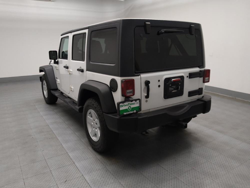 used 2013 Jeep Wrangler Unlimited car, priced at $15,495