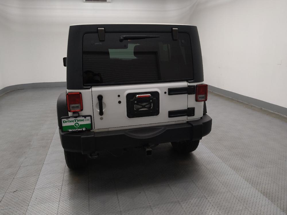 used 2013 Jeep Wrangler Unlimited car, priced at $15,495