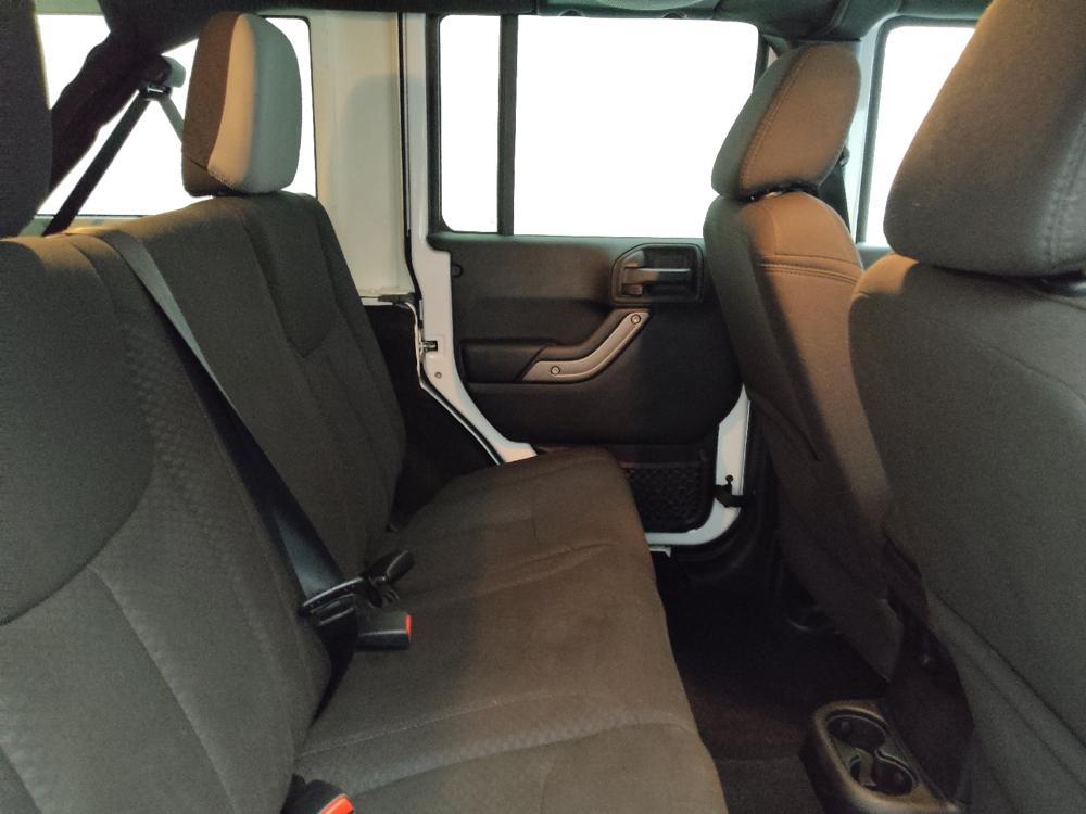 used 2013 Jeep Wrangler Unlimited car, priced at $15,495