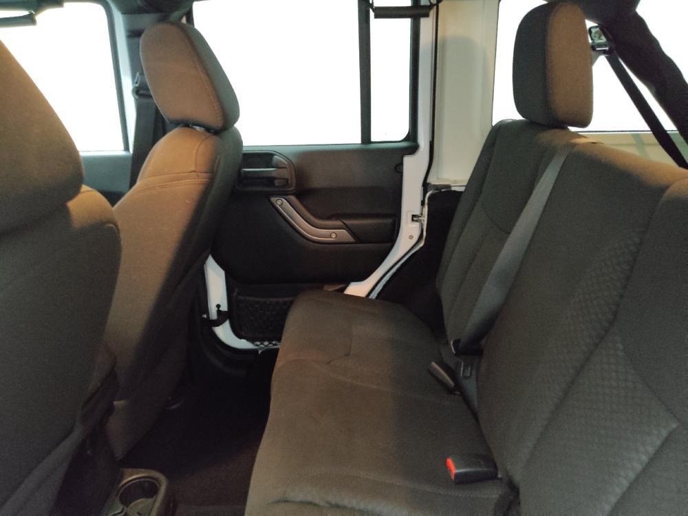 used 2013 Jeep Wrangler Unlimited car, priced at $15,495