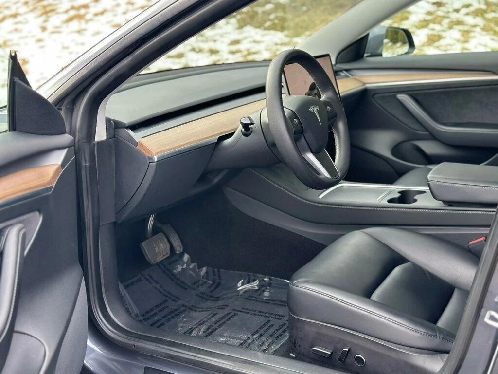 used 2023 Tesla Model 3 car, priced at $23,980