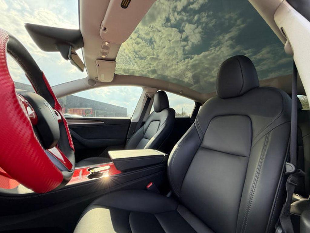 used 2024 Tesla Model Y car, priced at $35,995