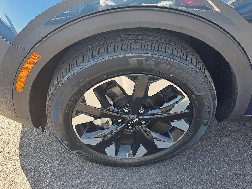 used 2023 Kia Sportage Plug-In Hybrid car, priced at $27,059