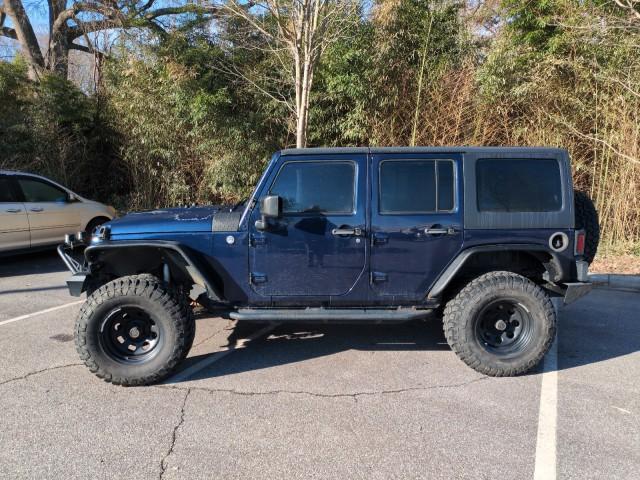 used 2013 Jeep Wrangler Unlimited car, priced at $15,866