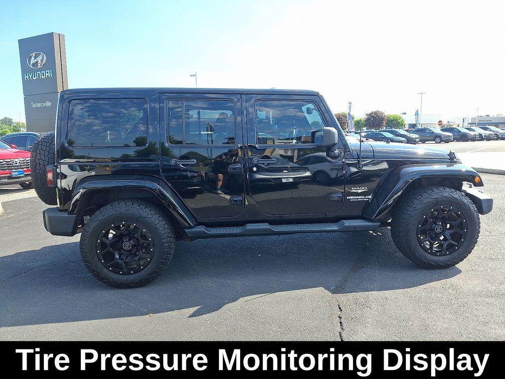 used 2013 Jeep Wrangler Unlimited car, priced at $15,213