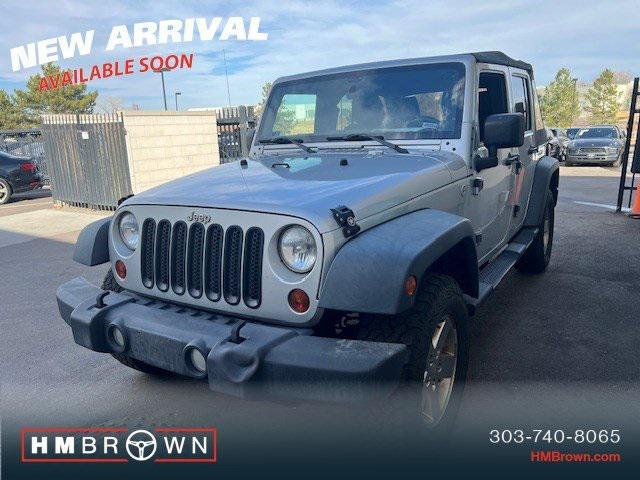 used 2011 Jeep Wrangler Unlimited car, priced at $14,000