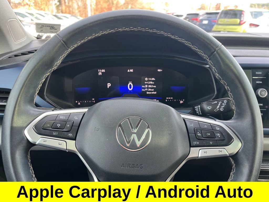 used 2023 Volkswagen Taos car, priced at $18,332
