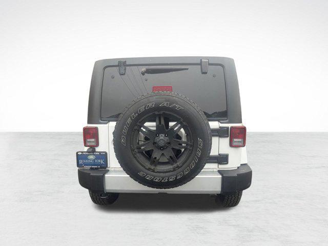 used 2013 Jeep Wrangler Unlimited car, priced at $13,595