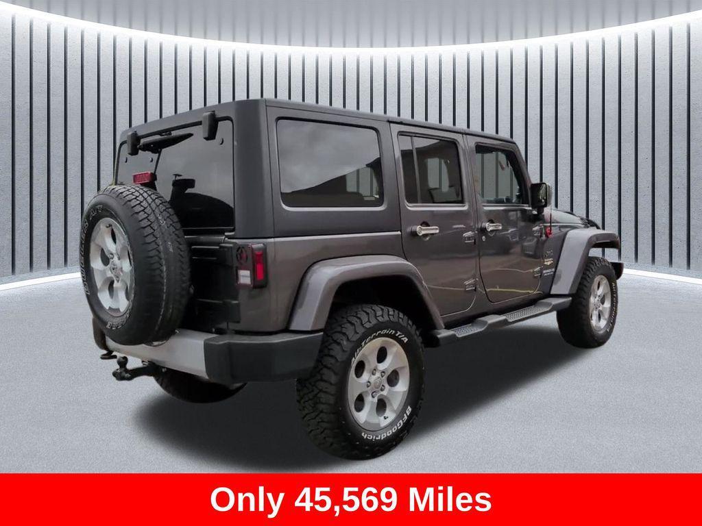 used 2014 Jeep Wrangler Unlimited car, priced at $19,692