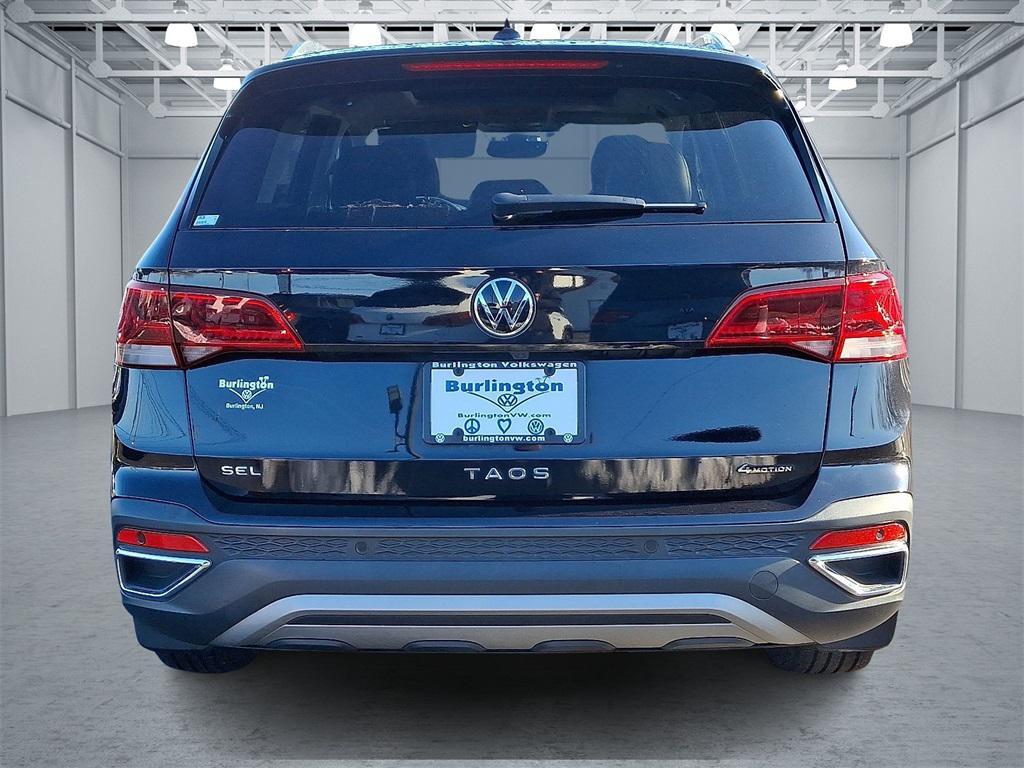 used 2023 Volkswagen Taos car, priced at $23,183