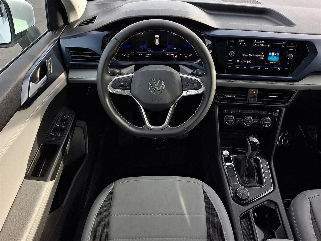 used 2024 Volkswagen Taos car, priced at $22,429