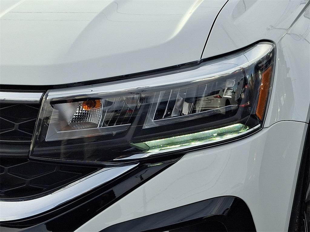 used 2024 Volkswagen Taos car, priced at $22,429