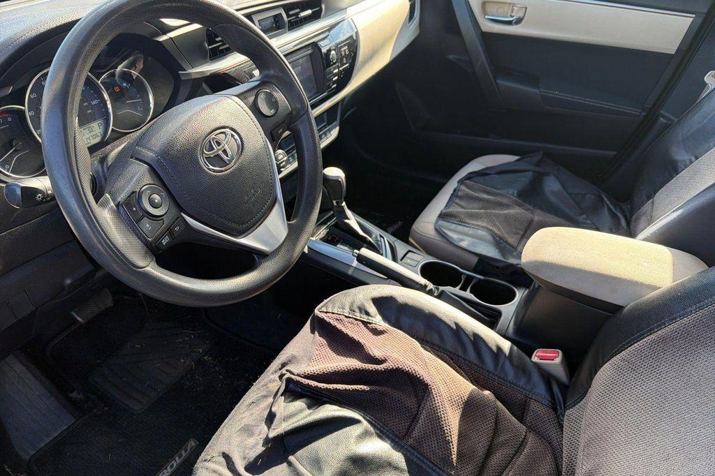 used 2014 Toyota Corolla car, priced at $11,000