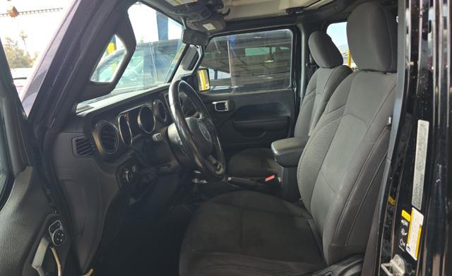 used 2023 Jeep Wrangler car, priced at $25,994