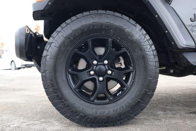 used 2022 Jeep Wrangler Unlimited car, priced at $25,740