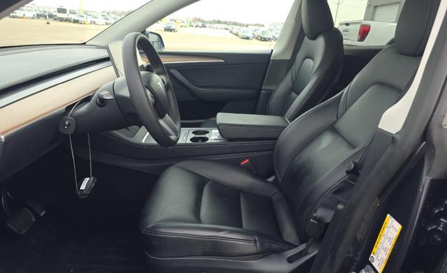 used 2025 Tesla Model Y car, priced at $40,610