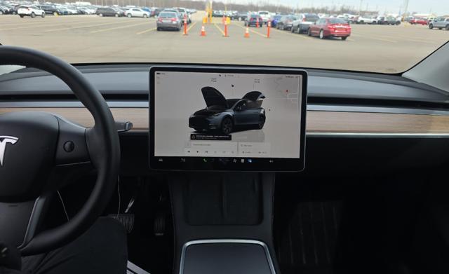 used 2025 Tesla Model Y car, priced at $40,610