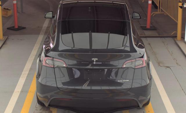 used 2025 Tesla Model Y car, priced at $40,610
