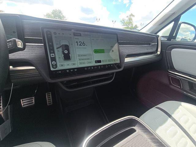 used 2024 Rivian R1S car, priced at $62,617