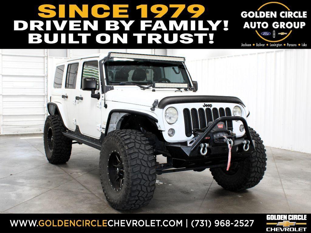 used 2014 Jeep Wrangler Unlimited car, priced at $17,398