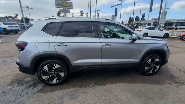 used 2025 Volkswagen Taos car, priced at $25,353