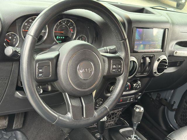 used 2015 Jeep Wrangler car, priced at $19,869