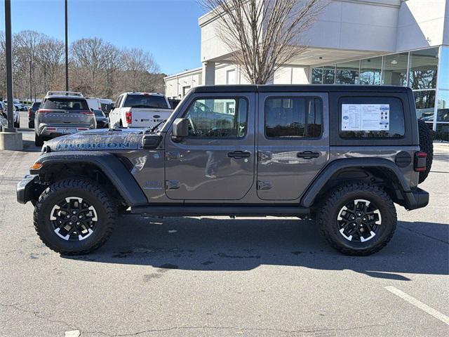 used 2024 Jeep Wrangler 4xe car, priced at $30,488