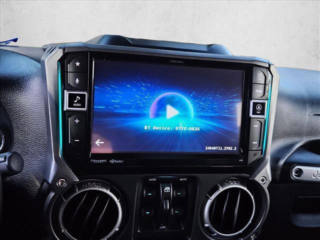 used 2014 Jeep Wrangler Unlimited car, priced at $19,879