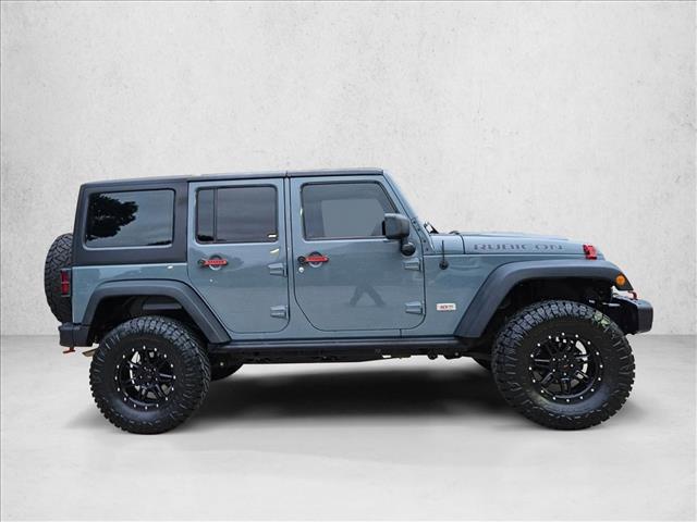 used 2013 Jeep Wrangler Unlimited car, priced at $17,951
