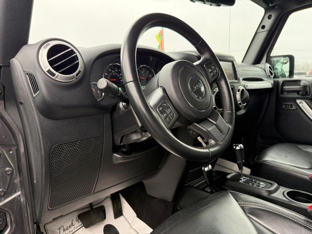 used 2018 Jeep Wrangler JK Unlimited car, priced at $27,388