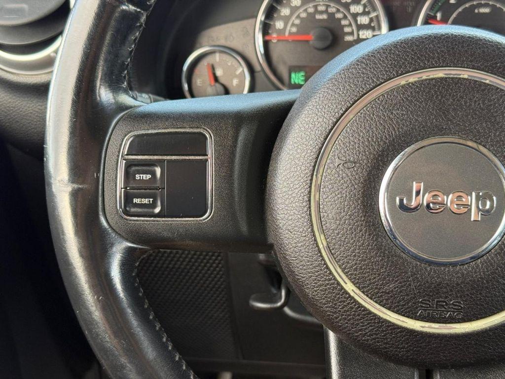 used 2011 Jeep Wrangler Unlimited car, priced at $15,242