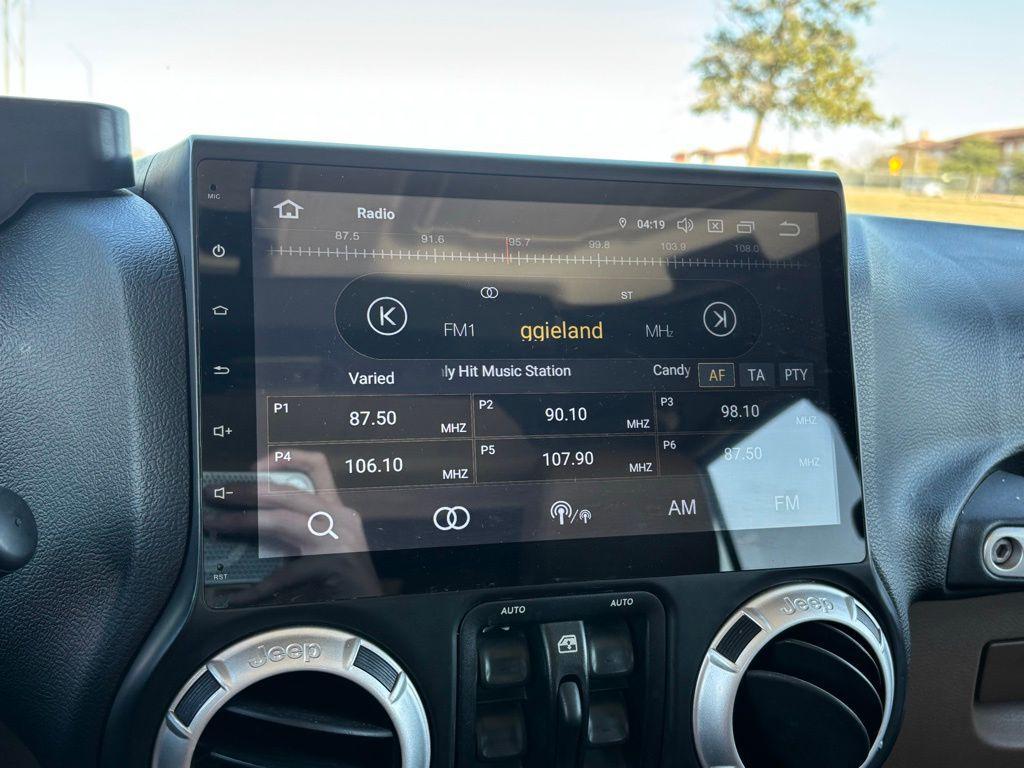 used 2014 Jeep Wrangler Unlimited car, priced at $16,378