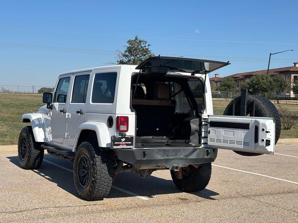 used 2014 Jeep Wrangler Unlimited car, priced at $16,378