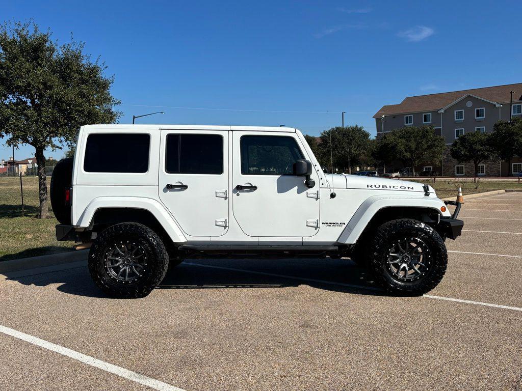 used 2014 Jeep Wrangler Unlimited car, priced at $16,378