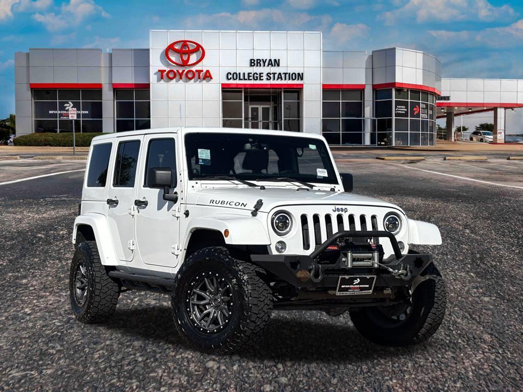 used 2014 Jeep Wrangler Unlimited car, priced at $16,378
