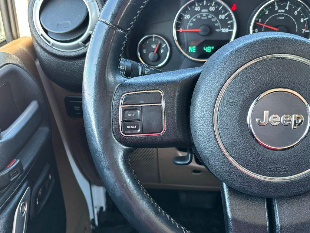 used 2014 Jeep Wrangler Unlimited car, priced at $16,378