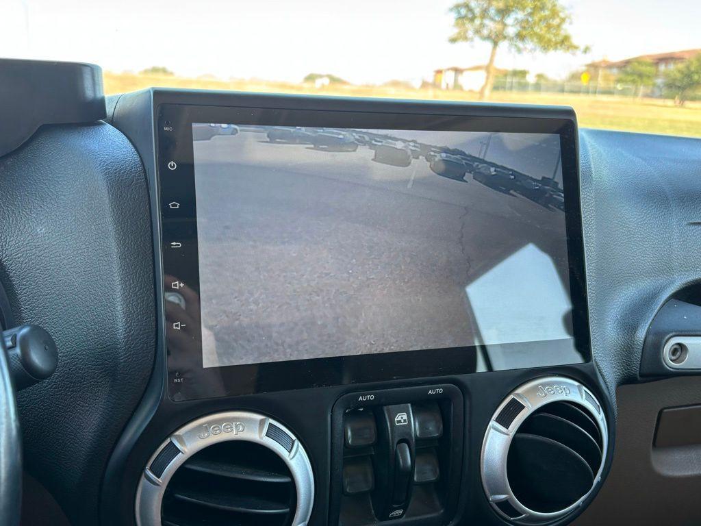 used 2014 Jeep Wrangler Unlimited car, priced at $16,378