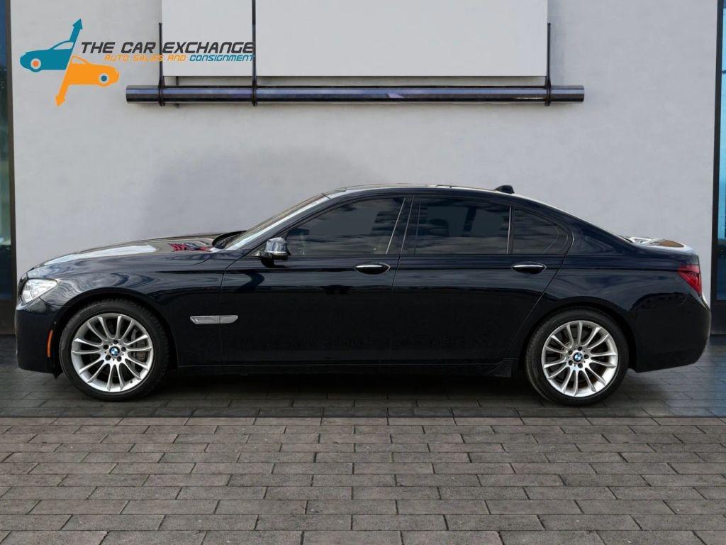 used 2015 BMW 750 car, priced at $14,500