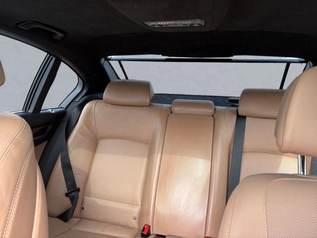 used 2015 BMW 750 car, priced at $14,500