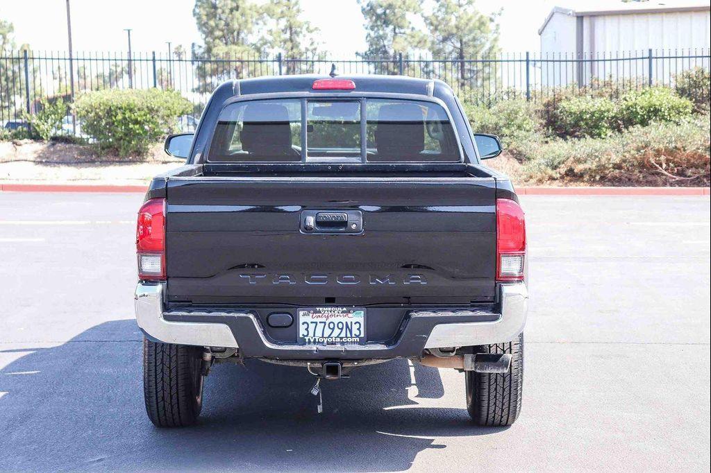 used 2021 Toyota Tacoma car, priced at $23,065
