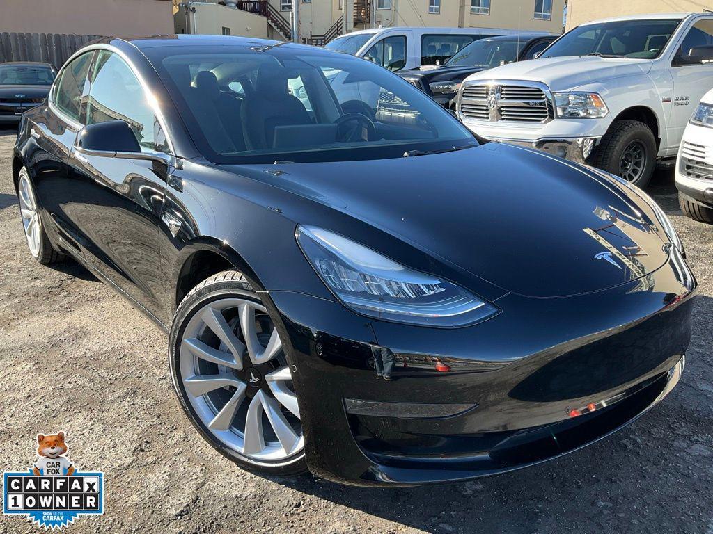 used 2018 Tesla Model 3 car, priced at $15,500