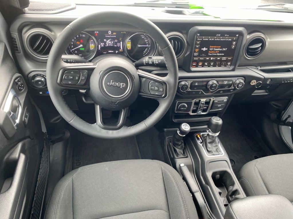 used 2023 Jeep Wrangler 4xe car, priced at $28,186