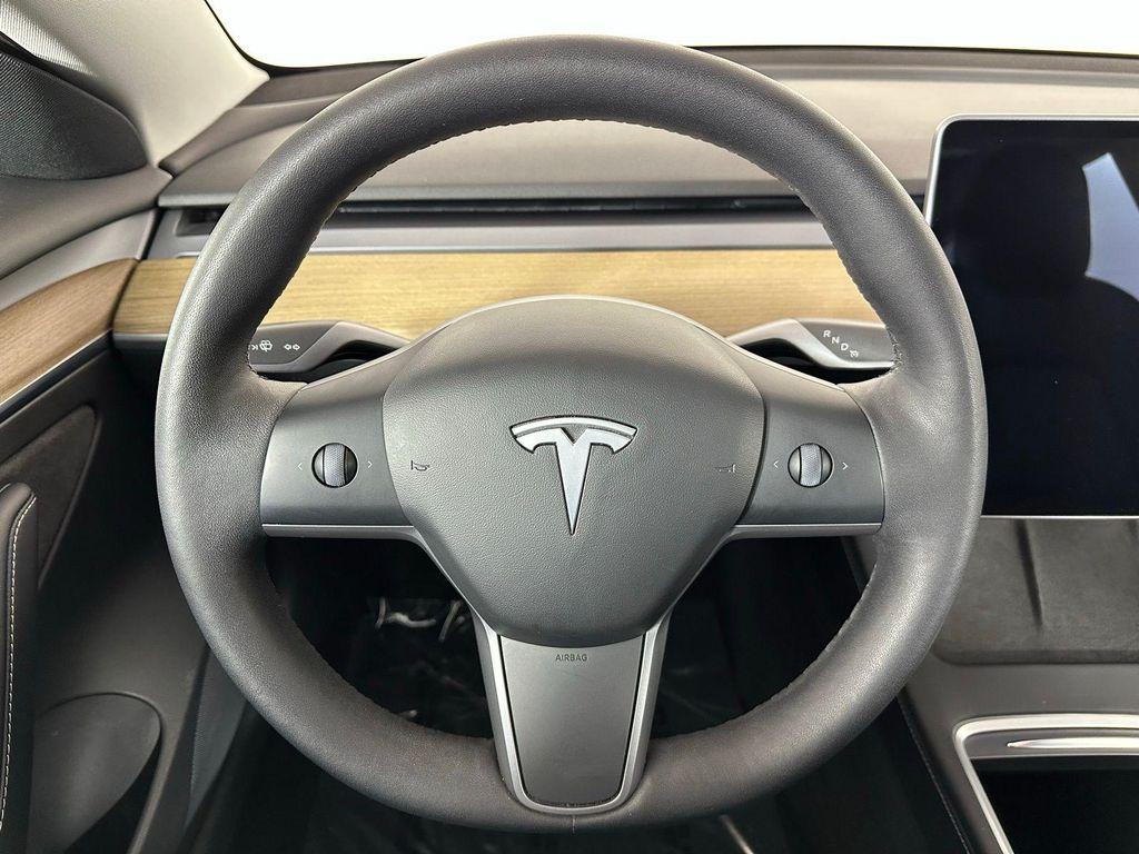 used 2023 Tesla Model 3 car, priced at $20,555