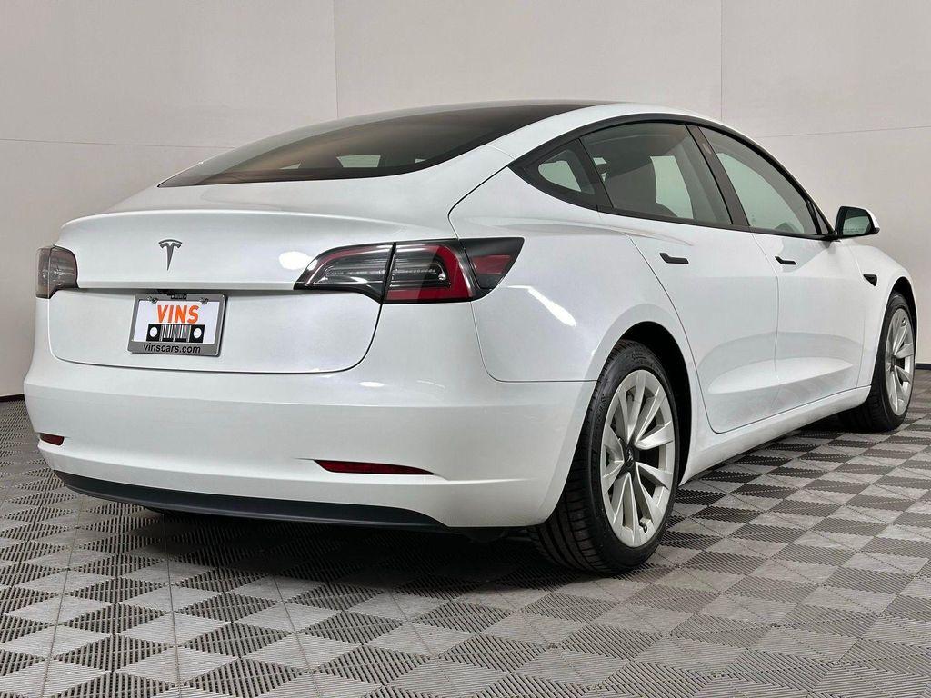 used 2023 Tesla Model 3 car, priced at $20,555