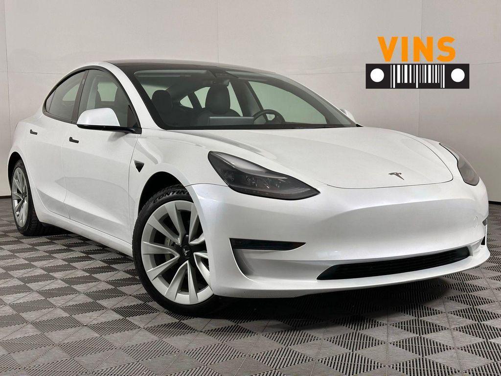 used 2023 Tesla Model 3 car, priced at $20,555