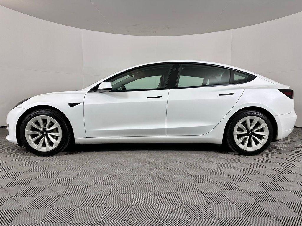 used 2023 Tesla Model 3 car, priced at $20,555